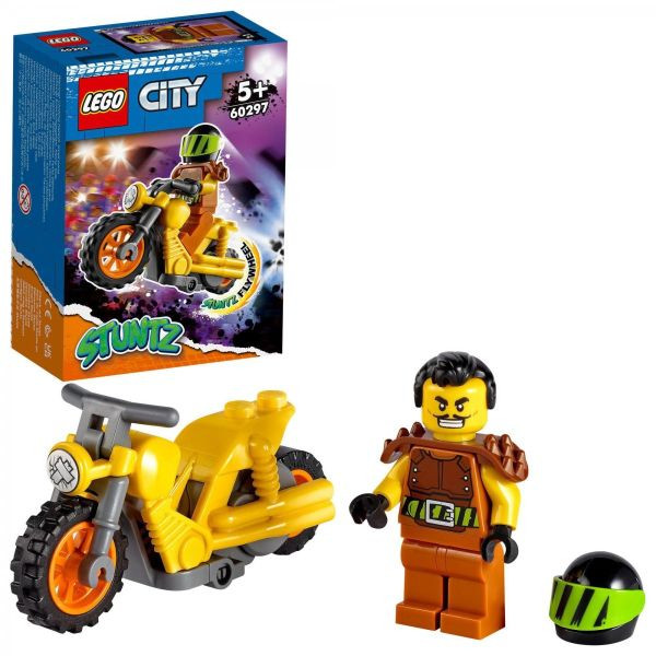 Gelbes Stuntbike und Fahrer mit einem braunen Kklamotten