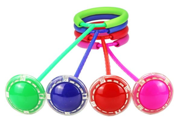 Fußkreisel in grün, blau, rot und pink